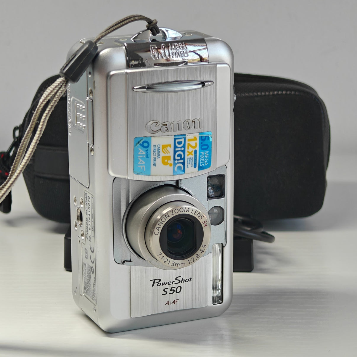 Canon PowerShot S50 Digital Camera Silver 5.0MP 3x Zoom Retro Digicam + Charger - Native Sole Cameras