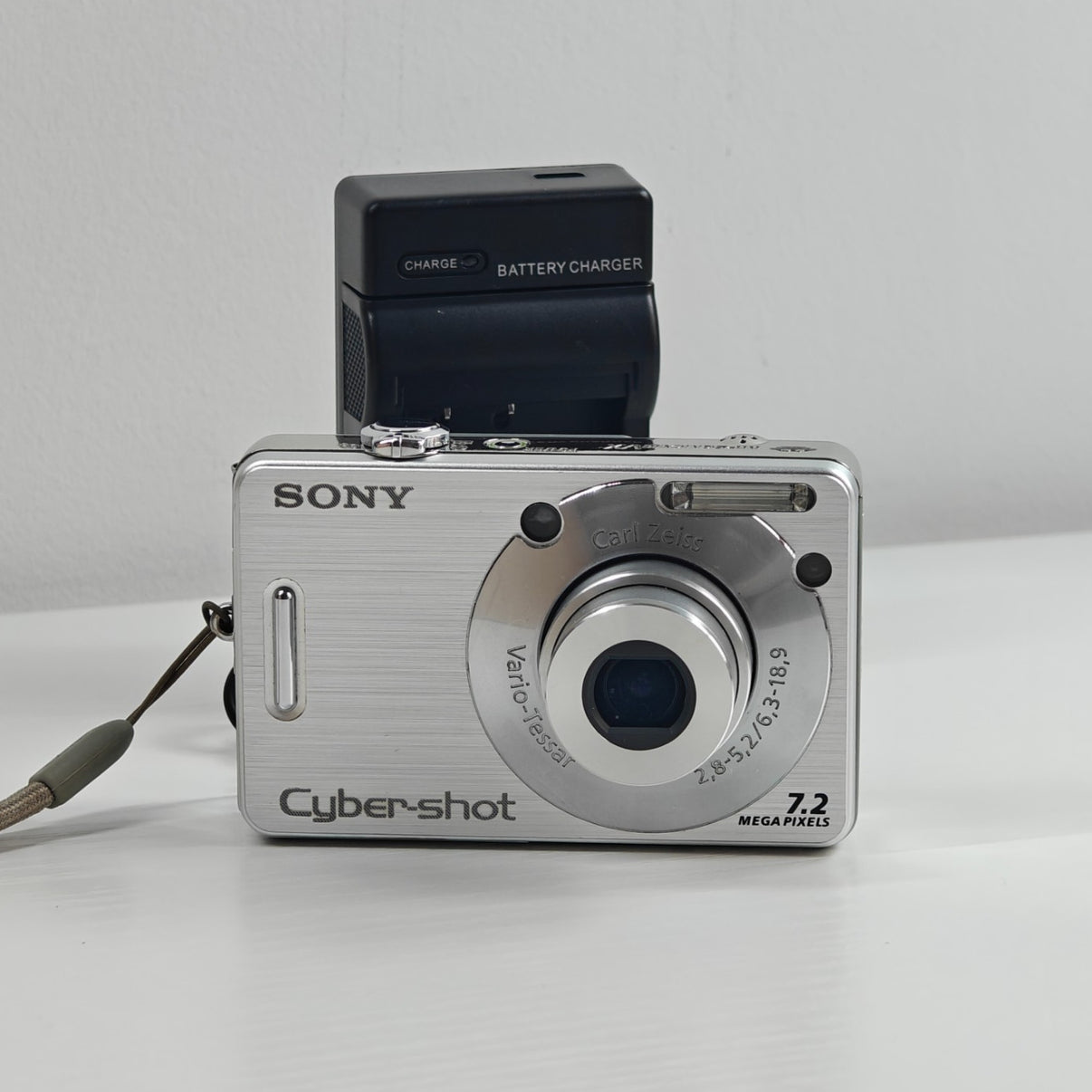 Sony Cyber-shot DSC-W70 7.2MP Digital Camera Silver Carl Zeiss Digicam + Charger - Native Sole Cameras