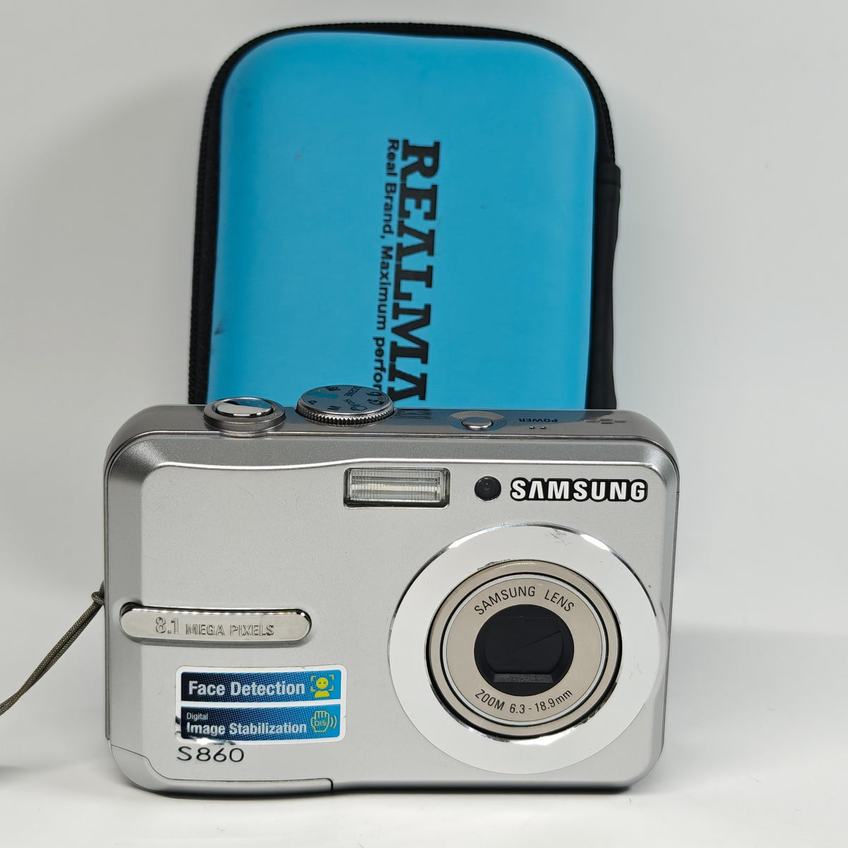 Samsung S860 8.1MP Digital Camera Silver 3x Zoom Compact Digicam + Blue Case - Native Sole Cameras