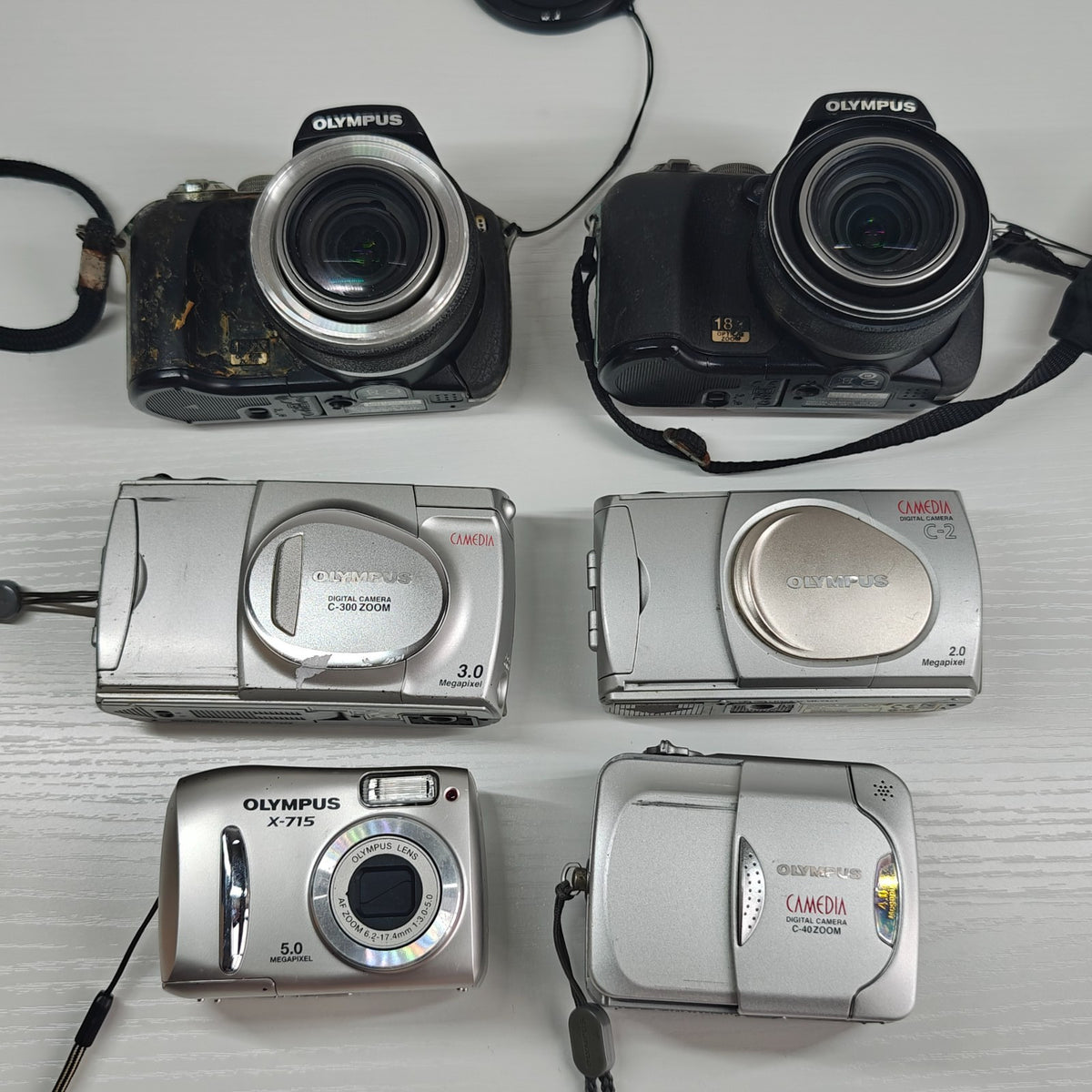 6x Olympus Digital Cameras Job Lot - C-2 C-300 C-40 X-715 SP-550UZ SP-560UZ - Native Sole Cameras